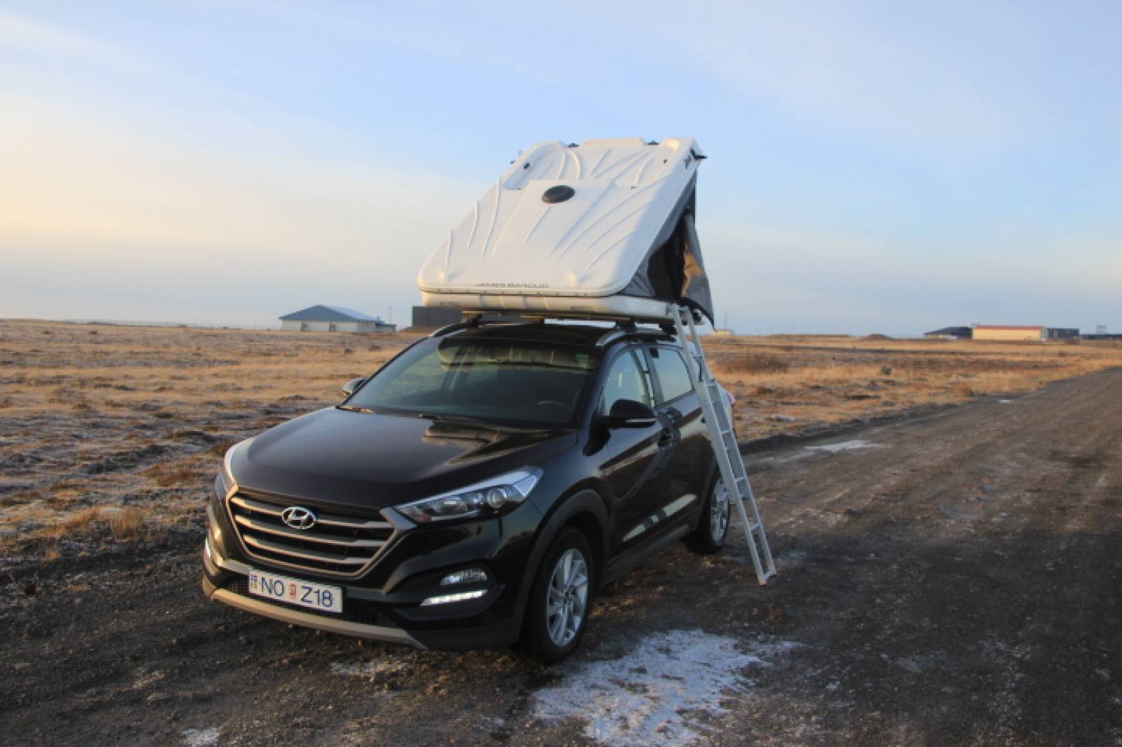 Tucson with roof Tent open with ladder